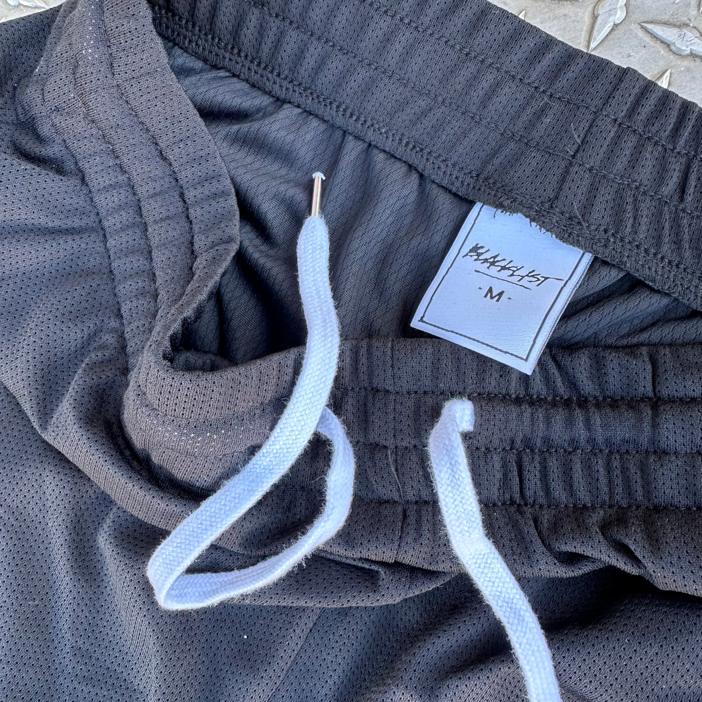 BLACKLISTRIGHTE EMBROIDERED COURT SHORTS