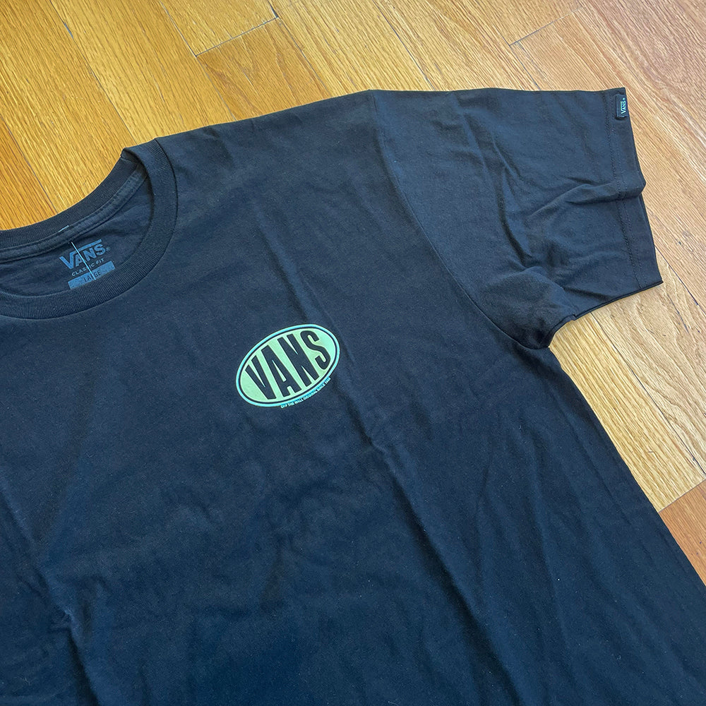 Dark Vans spray-on tee with small chest logo and crew neck