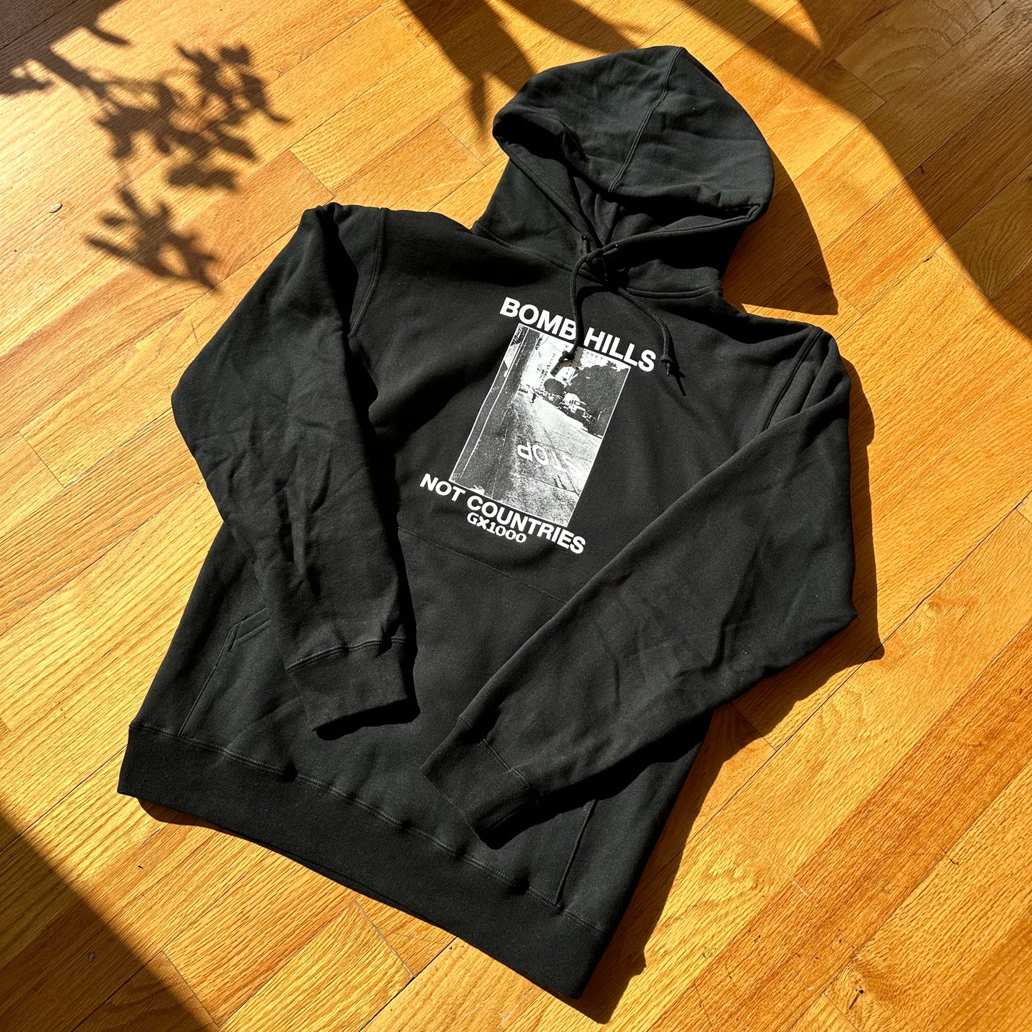 BOMB HILLS NOT COUNTRIES HOODIE (BLACK)