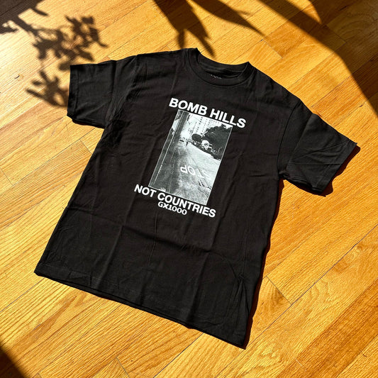 BOMB HILLS NOT COUNTRIES TEE (BLACK)