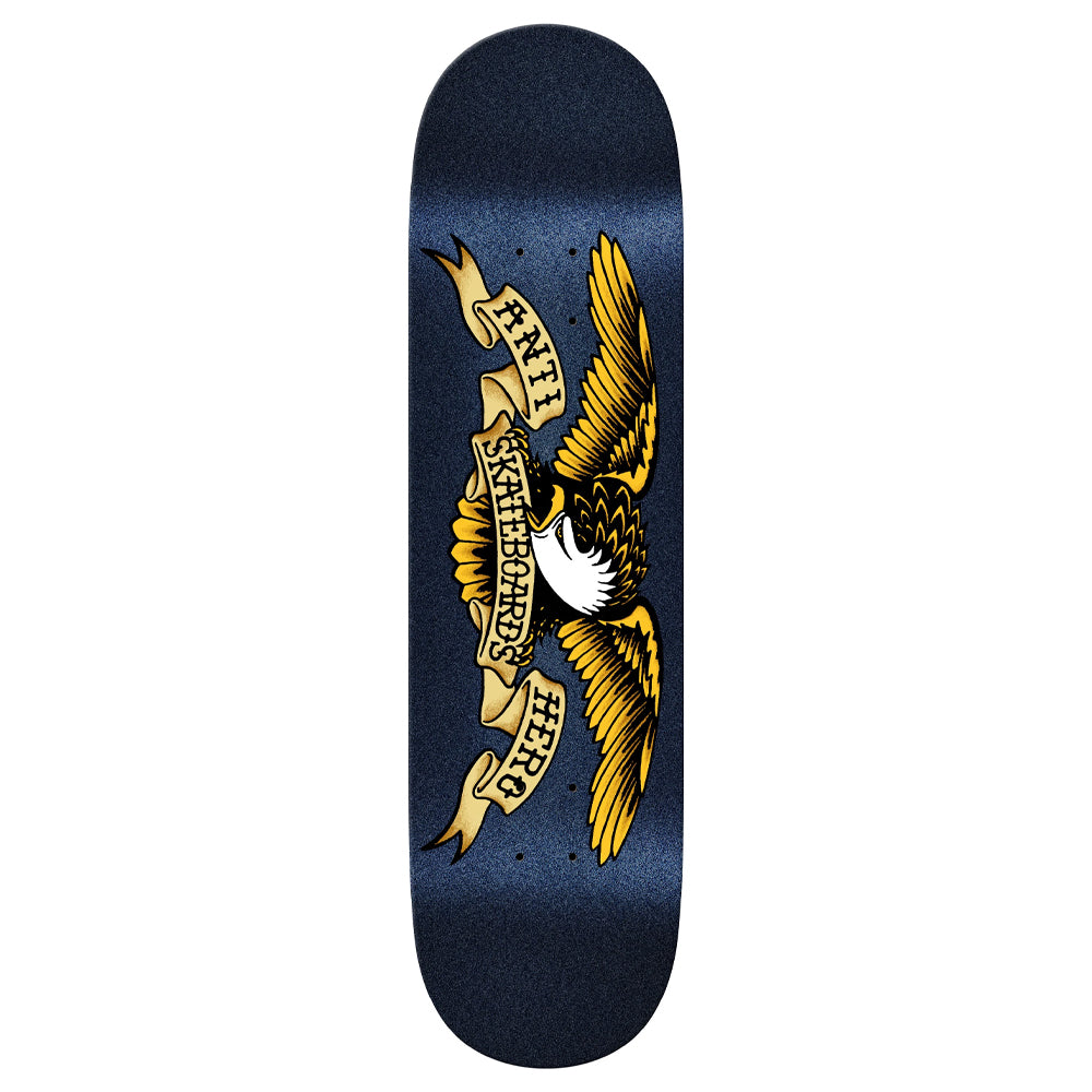 Skateboard deck with dark navy background and gold eagle graphic