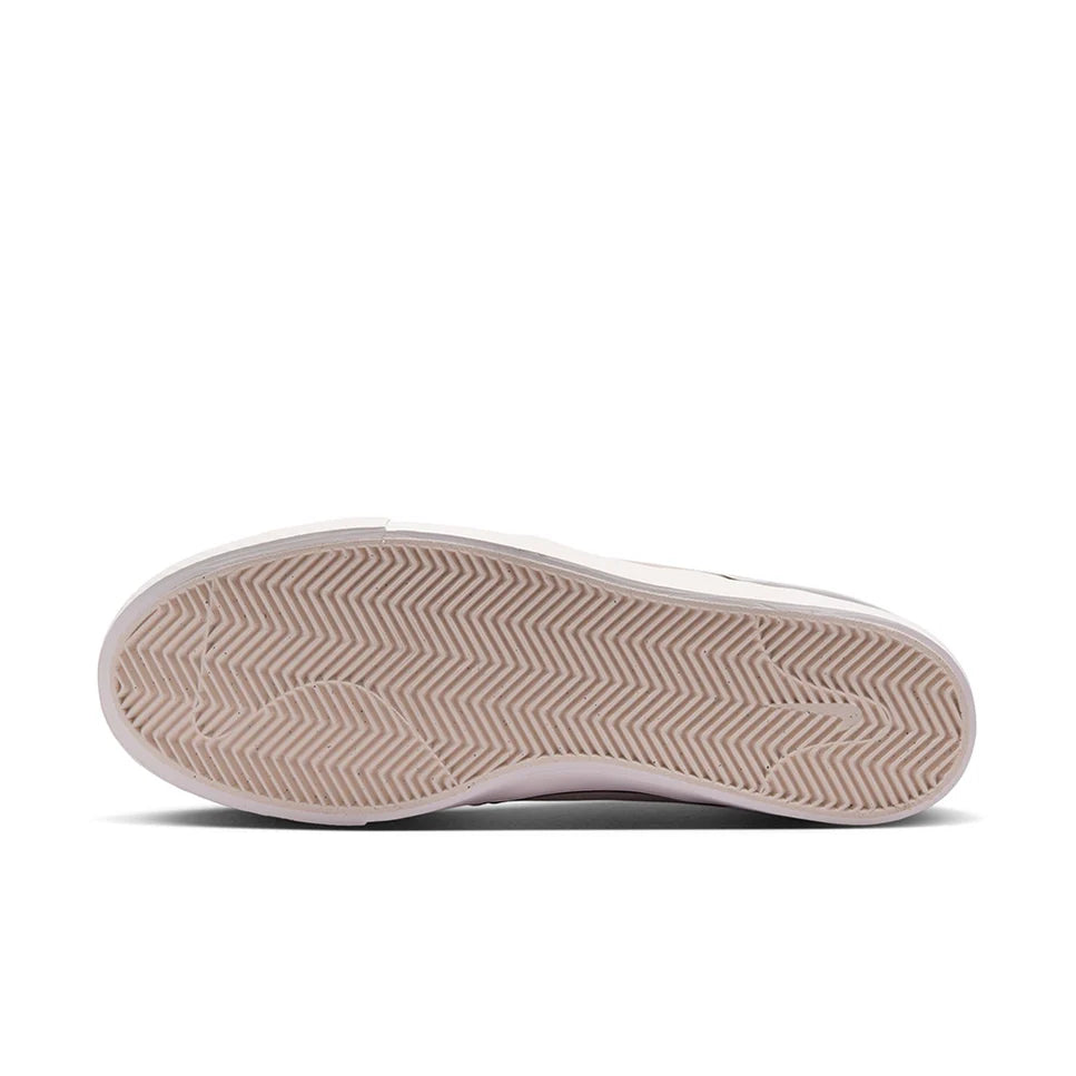 Light gray rubber cupsole outsole with zigzag tread pattern