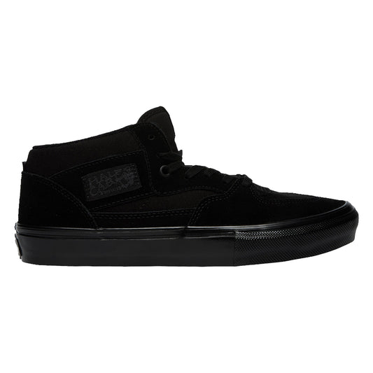Black lace-up skate shoe with suede upper, padded collar, and rubber cupsole