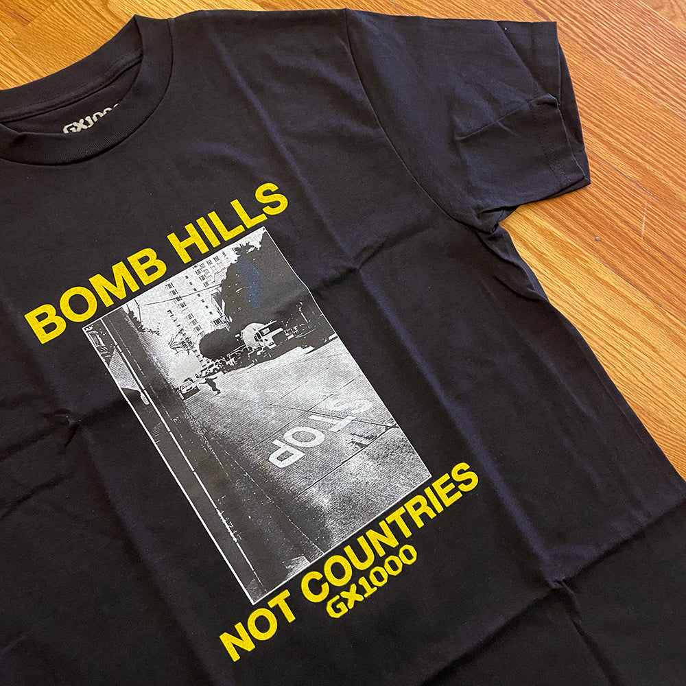 BOMB HILLS NOT COUNTRIES TEE (BLACK/YELLOW)